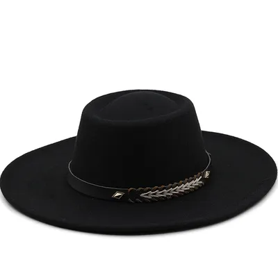 This Felt Hat Has A Dented Crown And Features A Wide Brim For Both Men And Women