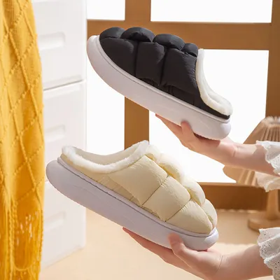 A Couple Wearing Cotton Shoes Outside
