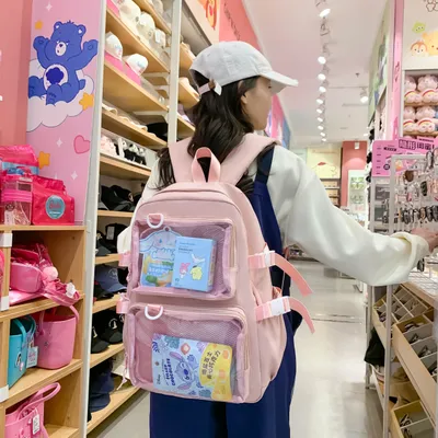 2D-style Backpack With Transparent Badges And Pins
