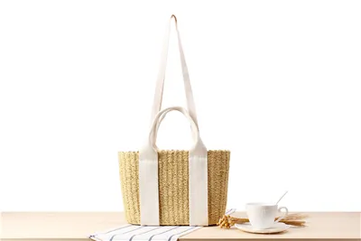 A New Semi-circle Fringed One-shoulder Straw Woven Bag Sui Sui Paper Woven Bag Beach Bag Fashion Female Bag