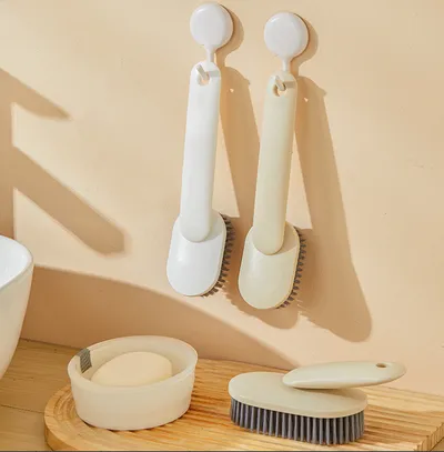 Shoe brush with inclined handle-cream color-bristle PET+ handle PP-1 piece