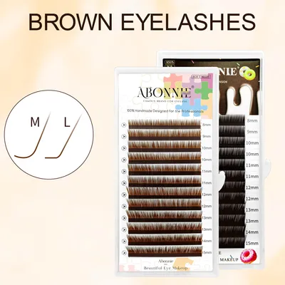 Single Row Round Tipped Brown Curled Lashes With A Fox Style Slightly Swept Up Look