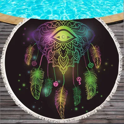 Round beach towel with colorful feathers and tassels