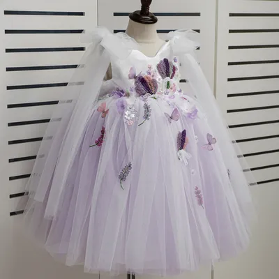 A Little Girl Wore A Princess Dress With A Decal Bow