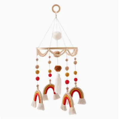 Handmade Rainbow Bed Bell In Front Of Baby Toy Bed