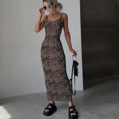 A Slimming And Figure-hugging Dress With Fashionable Prints